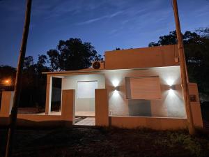 a rendering of a house at night at Doña Mercedes in Verónica