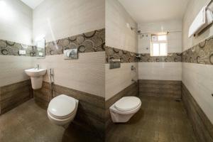 Koupelna v ubytování Daan Temple Inn + 37 fotografií