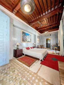 Postel nebo postele na pokoji v ubytování Riad Slitine & Spa