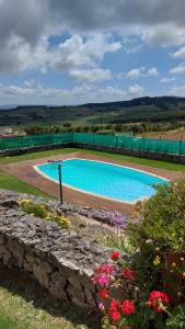 A piscina em ou perto de Casal Serrano Charme e Tranquilidade