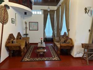 Posezení v ubytování Princess Bungalows