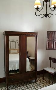 Łóżko lub łóżka w pokoju w obiekcie Fuentepiedra Casa Rural Categoría Superior