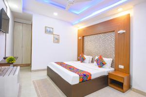 Ένα ή περισσότερα κρεβάτια σε δωμάτιο στο FabHotel Prime Zen Inn - Nr Apollo Hospital +28 φωτογραφίες