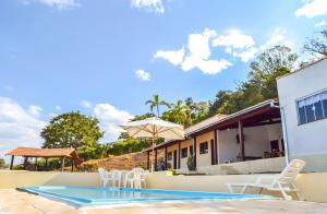 Swimmingpoolen hos eller tæt på Rancho Boa Vista - Capitólio - MG
