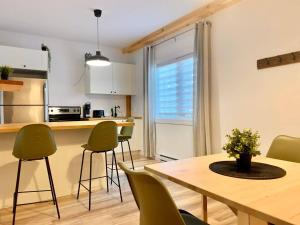 Η κουζίνα ή μικρή κουζίνα στο Condos St-Côme - Bohémien, au coeur des activités +6 φωτογραφίες