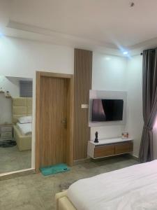 Μια τηλεόραση ή/και κέντρο ψυχαγωγίας στο House27 Homes