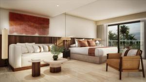 Postel nebo postele na pokoji v ubytování Grand Palladium Select Bávaro - All Inclusive