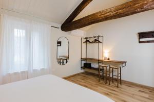 Postel nebo postele na pokoji v ubytování Locanda sul fiume