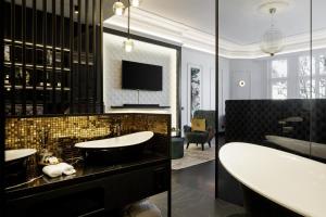TV a/nebo společenská místnost v ubytování O11 Boutique Hotel Vienna
