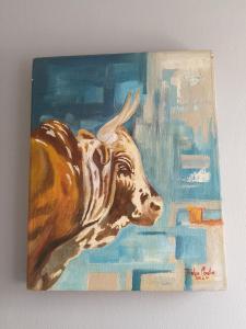 a painting of a brown and white dog at Houghton Luxurious Home in Johannesburg