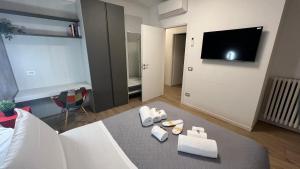 Televízia a/alebo spoločenská miestnosť v ubytovaní san rocco apartments