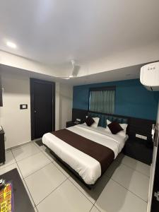 Ένα ή περισσότερα κρεβάτια σε δωμάτιο στο Hotel Sunview