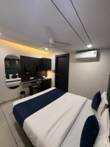 Ένα ή περισσότερα κρεβάτια σε δωμάτιο στο Hotel Sunview