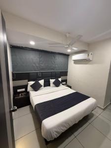 Ένα ή περισσότερα κρεβάτια σε δωμάτιο στο Hotel Sunview