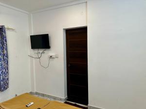 TV a/nebo společenská místnost v ubytování M M Residency + 14 fotografií