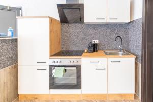 Kuchyň nebo kuchyňský kout v ubytování Modernes Apartment in Neuwied + 2 fotografie
