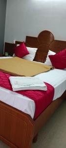 Letto o letti in una camera di Tn27callingkrishholiday