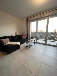 Et opholdsområde på Luxury apartment near CDG & Parc Asterix