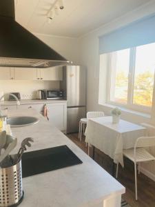 Η κουζίνα ή μικρή κουζίνα στο Otepää city view apartment