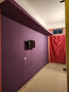 TV a/nebo společenská místnost v ubytování Moonlight Cottage