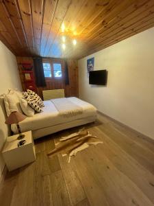 A television and/or entertainment centre at Chalet Blaise Chamonix Mont Blanc Valley