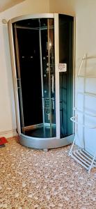 a room with a revolving door in a building at Gite de la ferme in Bertignat +26 photos