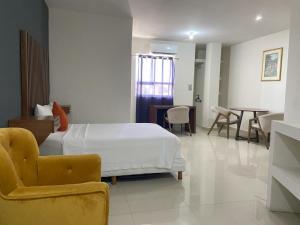 Postel nebo postele na pokoji v ubytování Hotel NUVE EXPRESS