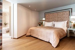 Rúm í herbergi á Hotel Eden Roc - The Leading Hotels of the World