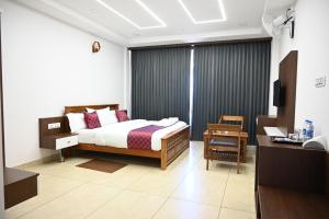 Postel nebo postele na pokoji v ubytování Hotel Aamis Villa
