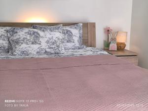 Voodi või voodid majutusasutuse Apartma REA Izola, pergola & terassa, parking toas