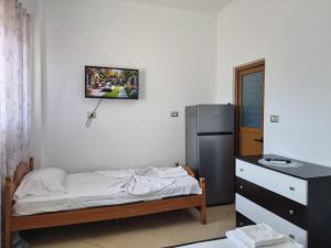 Postel nebo postele na pokoji v ubytování Apartment Besnik Brahimi Ksamil