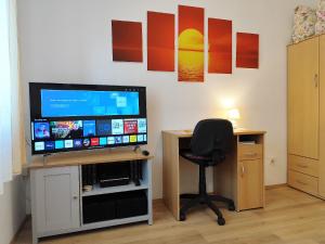 TV a/nebo společenská místnost v ubytování Apartment Carmen