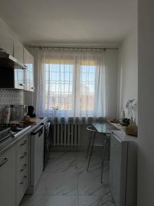 Kuchyňa alebo kuchynka v ubytovaní Apartament -Jak w domu- Czeladź 60m2 Centrum Katowic 10km