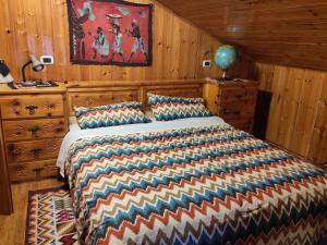 Letto o letti in una camera di La cuccia di Elfo