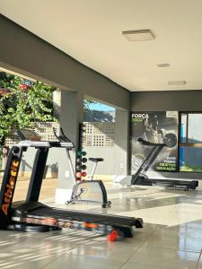 a gym with two tread machines in a room at Flat no Condomínio Alto da Serra Villas in Bananeiras