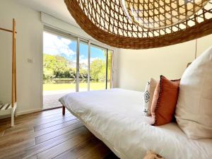 Postel nebo postele na pokoji v ubytování Villa Bota Nova