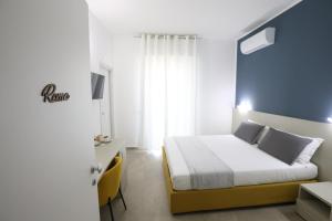 Postel nebo postele na pokoji v ubytování La città del riso
