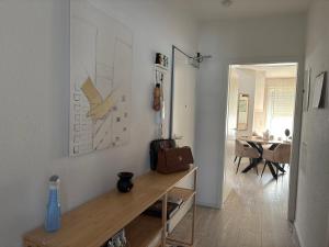 a living room with a table and a dining room at ERBEX to in Dietzenbach +7 photos