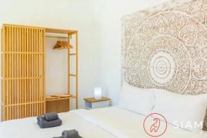 Ένα ή περισσότερα κρεβάτια σε δωμάτιο στο Villa Laura 2br & Private Pool +21 φωτογραφίες