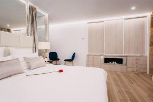 Postel nebo postele na pokoji v ubytování Casa Albarari Boutique Double Rooms with access to shared Infinity Pool + 28 fotografií