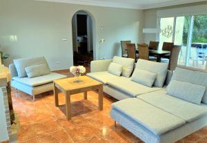 A seating area at Luxury Villa at La Sella Resort