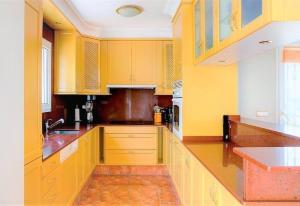 A kitchen or kitchenette at Luxury Villa at La Sella Resort