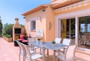 A balcony or terrace at Luxury Villa at La Sella Resort