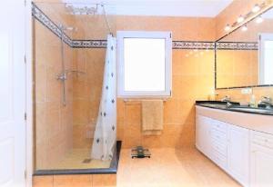 A bathroom at Luxury Villa at La Sella Resort