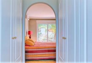 A bed or beds in a room at Luxury Villa at La Sella Resort