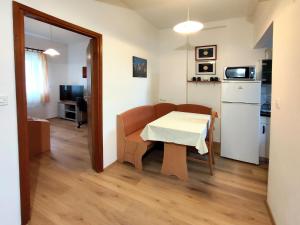 Kuchyň nebo kuchyňský kout v ubytování Apartment Carmen