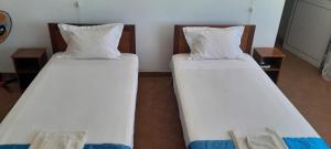 Letto o letti in una camera di Cacimba Sunset Lodge