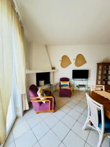 Posezení v ubytování Amoredimare Casa Vacanze + 37 fotografií