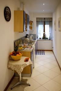 Kuchyňa alebo kuchynka v ubytovaní B&B Il Sasso Antico