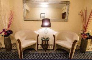 Uma área de estar em Hotel Garni Ideal